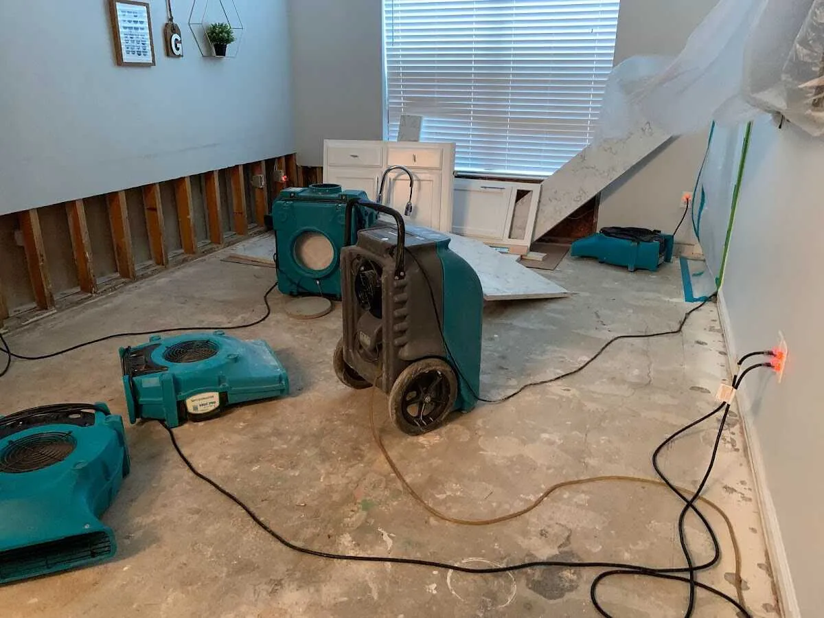 Dehumidifier in flood-cut room for Water Damage Restoration in St. Simons